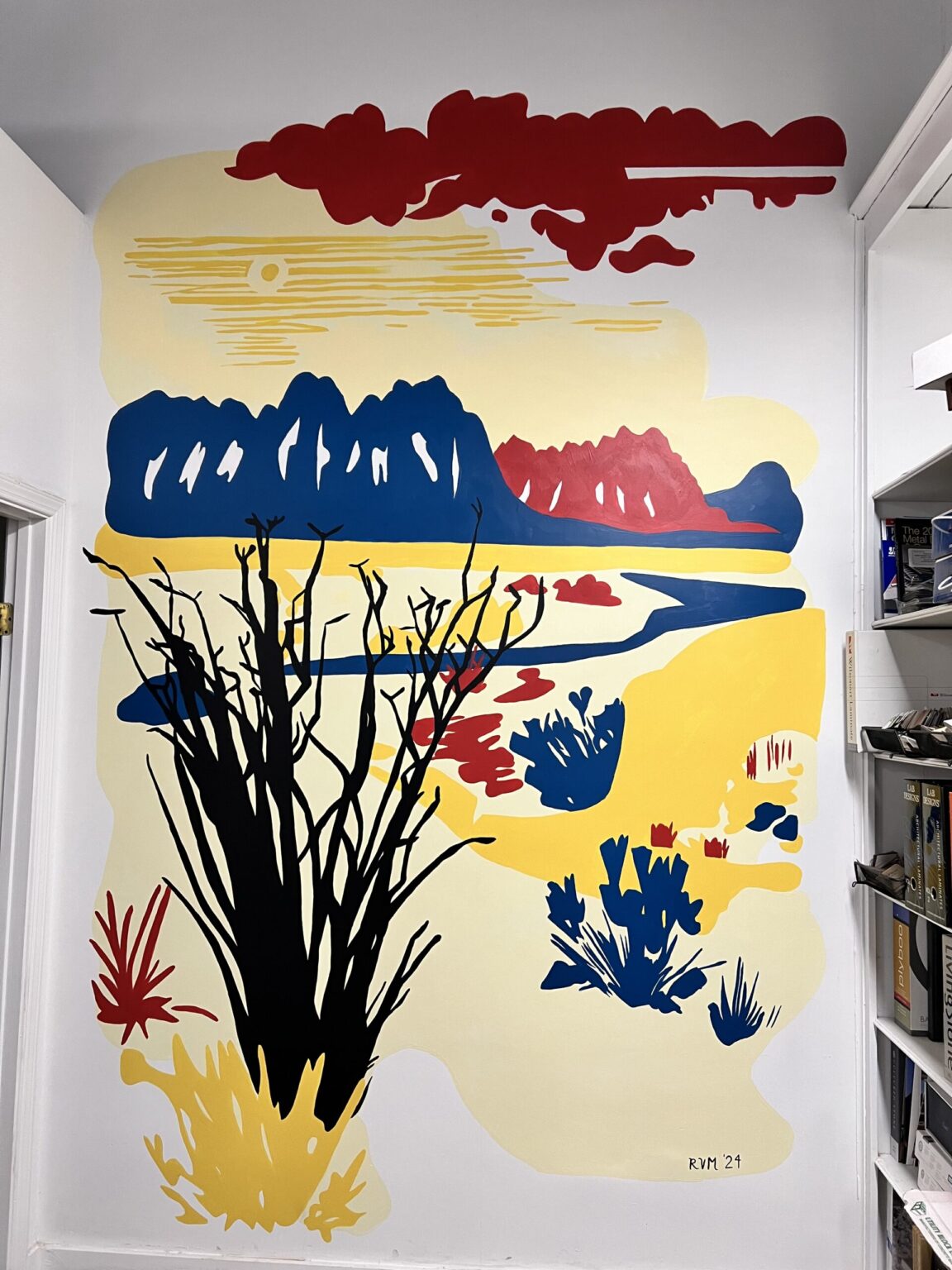 The Desert Peak office mural seen from the studio corner