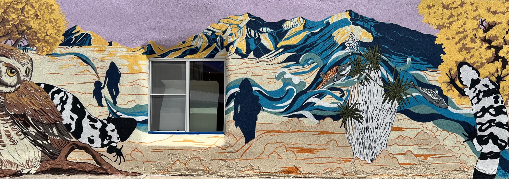 The finished Endangered Species mural painted across the wall